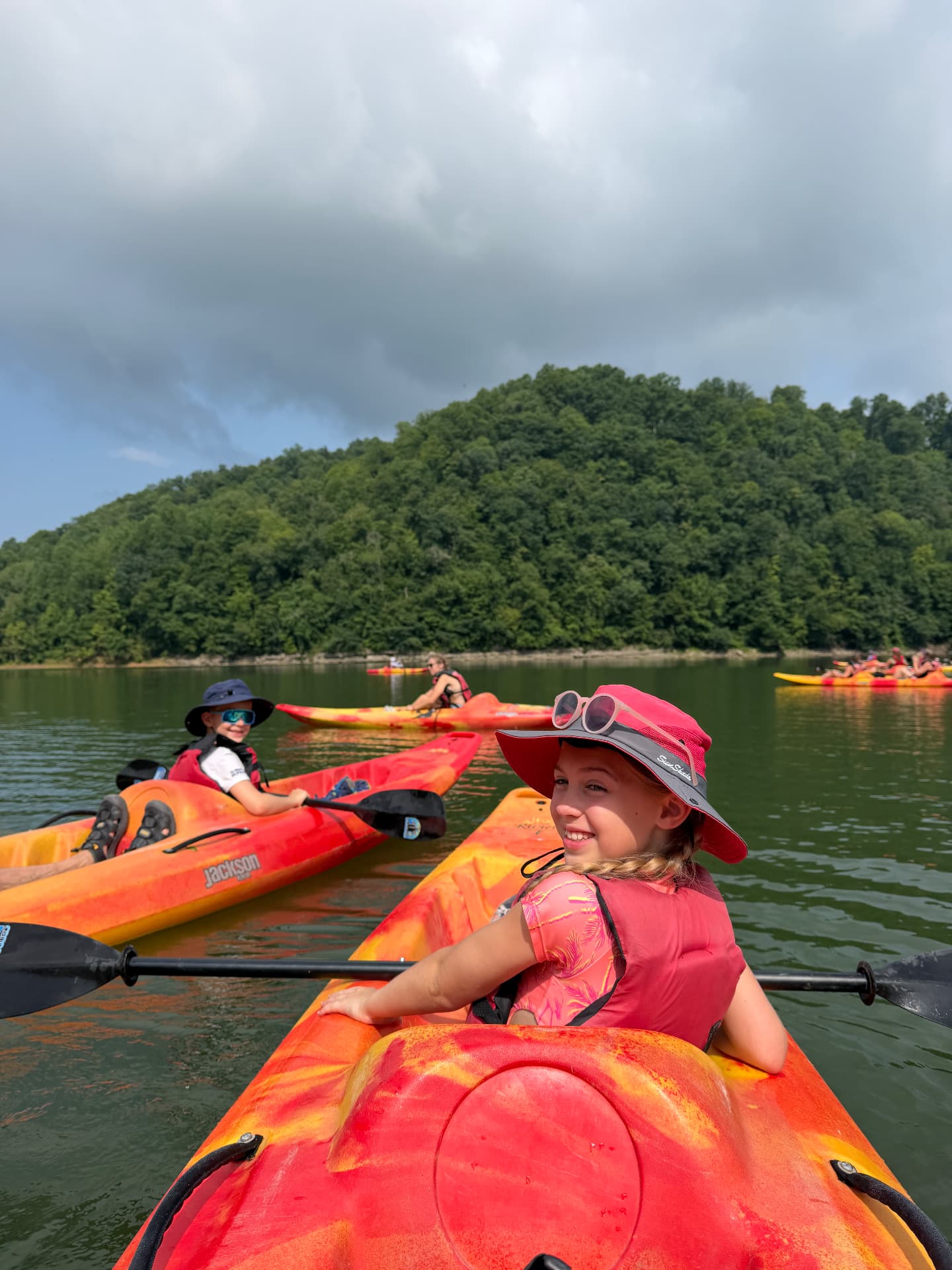 Our kids paddling their own kayaks on the way to Burgess Falls with Cumberland Kayak