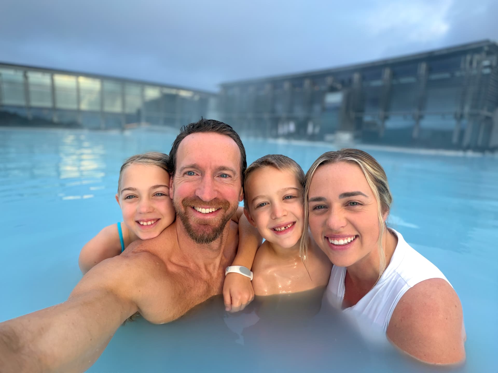 Our whole family soaking in the milky blue water, the easiest way to reset after a long drive