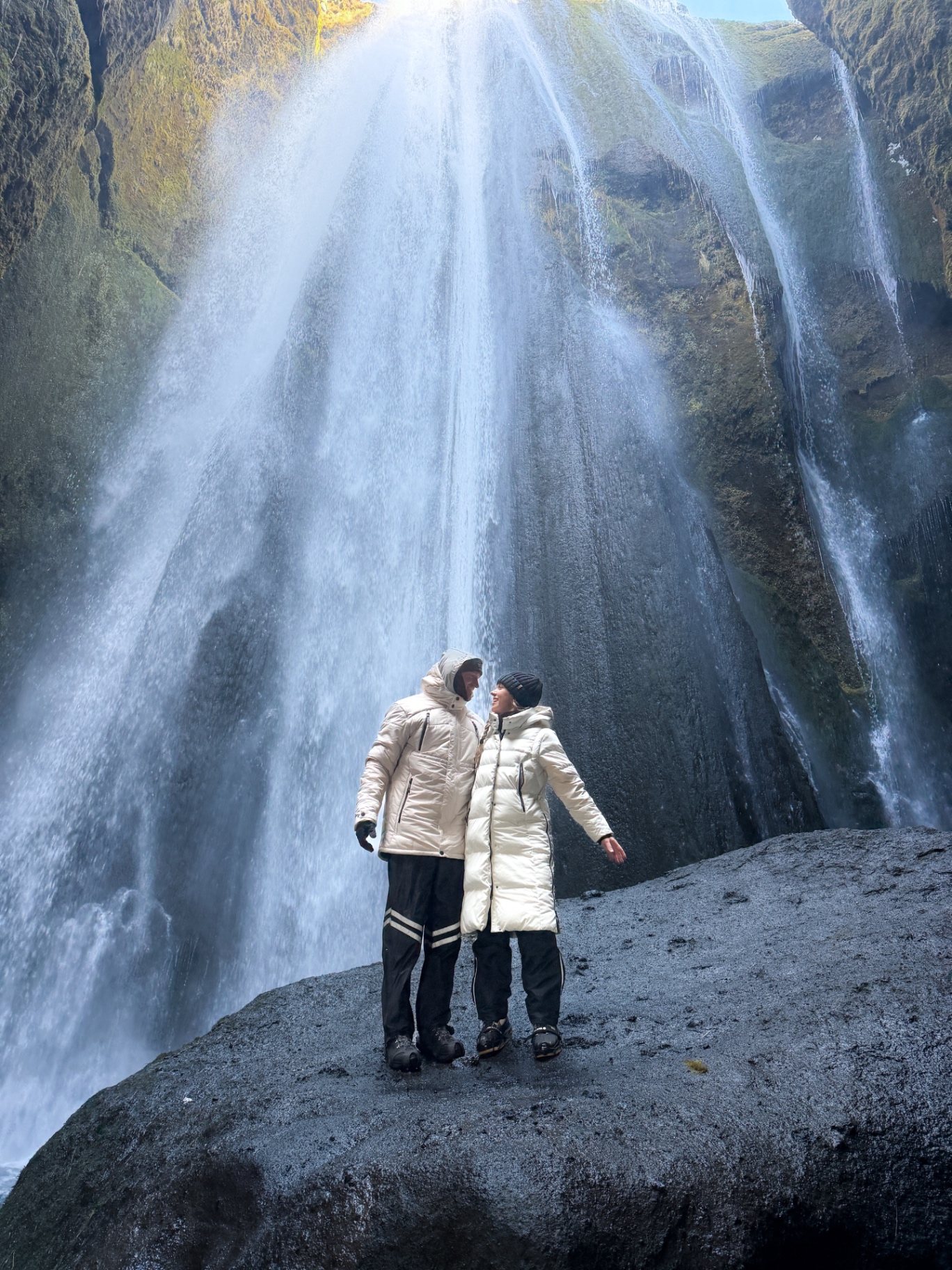 The Venture Seekers under Gljúfrabúi waterfall in Iceland