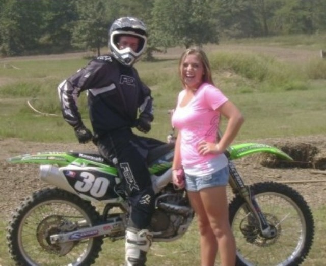 Jake back in his motorcycle technician days, and me right by his side