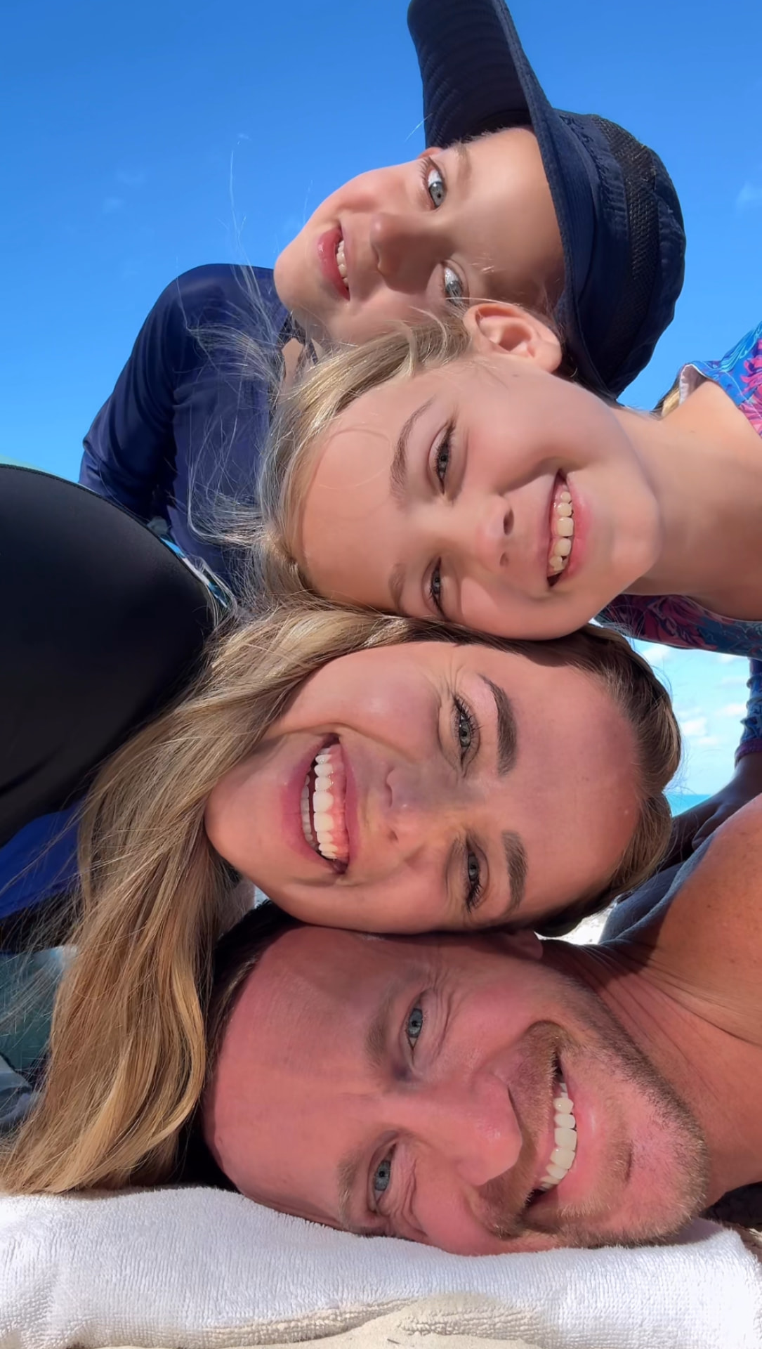 All four of us squished together on the beach, our favorite kind of classroom