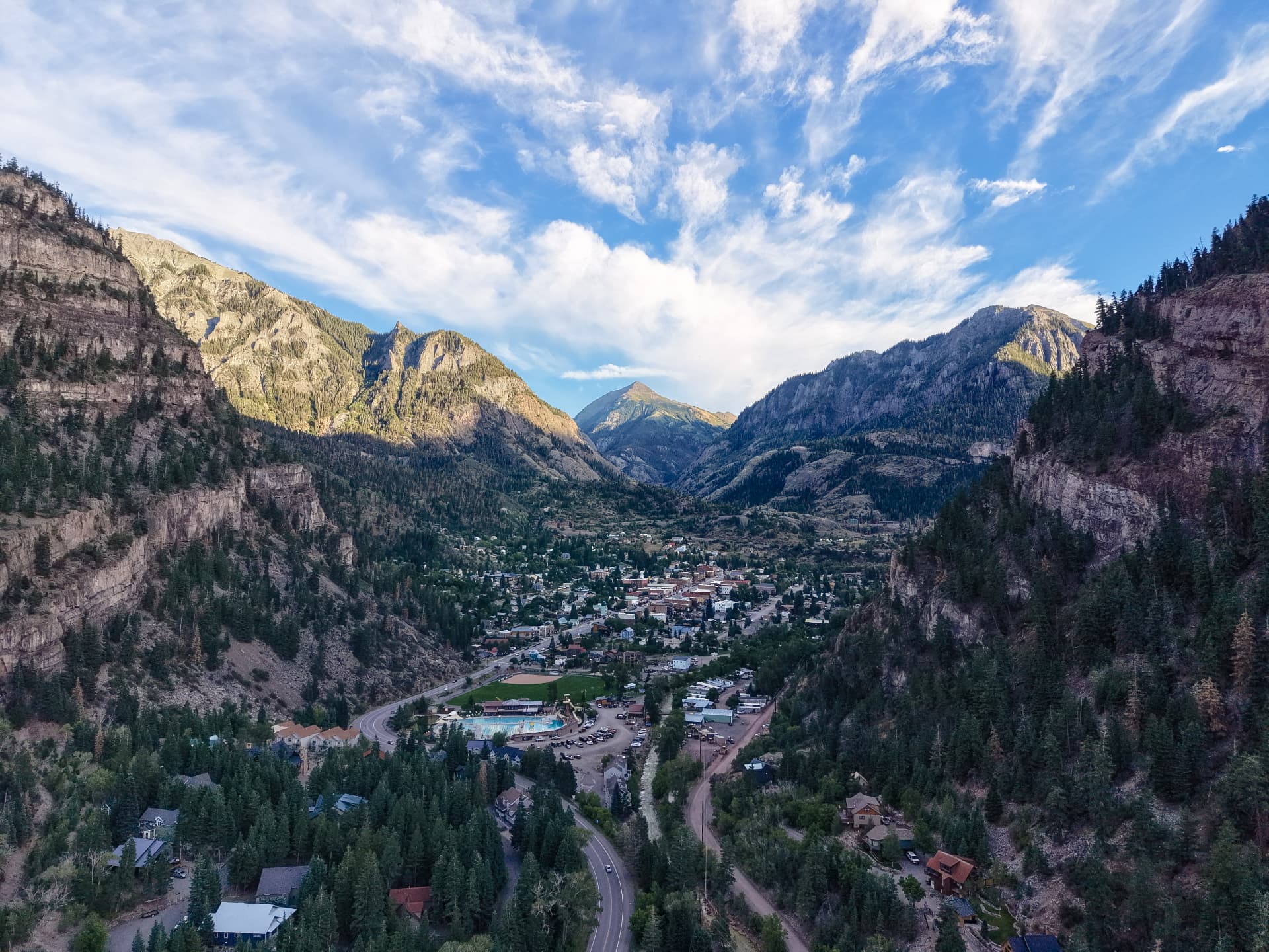 Aerial view of the town of Ouray, Colorado tucked into its box canyon in the San Juan Mountains