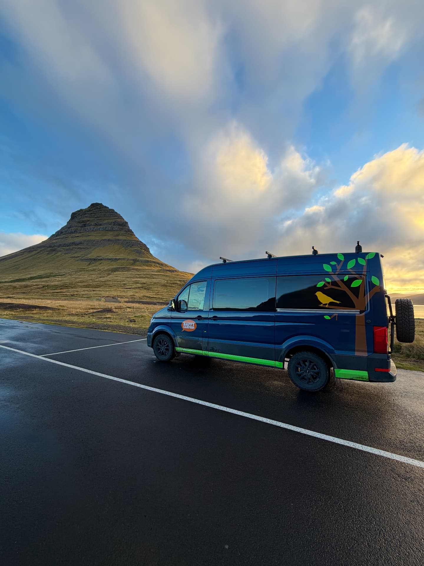 Our blue Happy Campers 4x4 XL parked beside Kirkjufell in Iceland