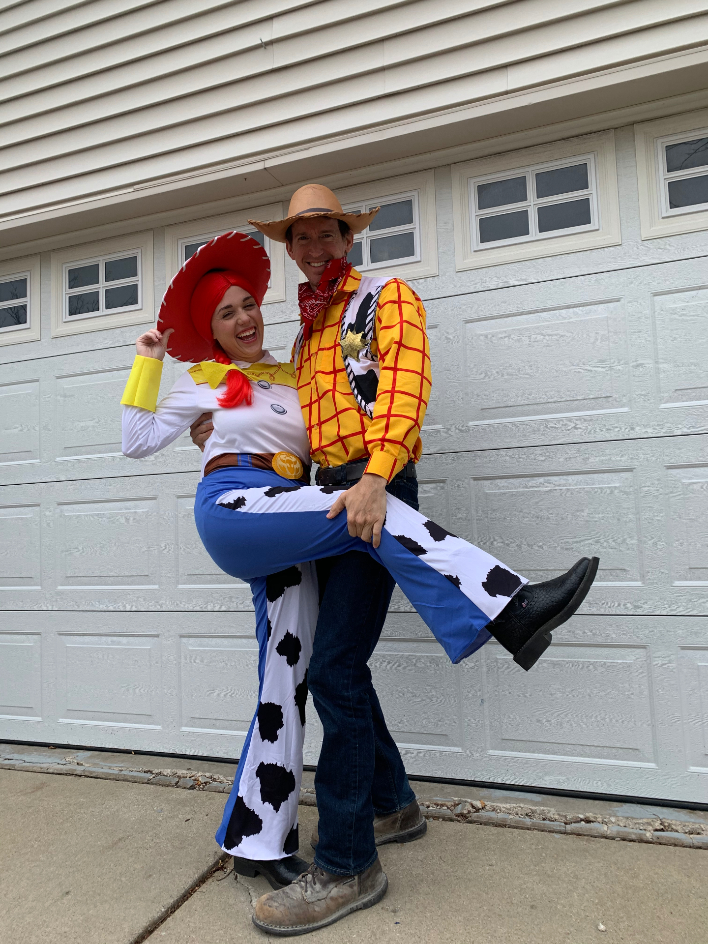 Brittany and Jake dressed as Jessie and Woody from Toy Story for a surprise Disney visit